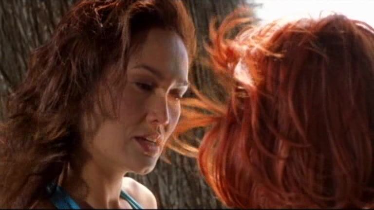 Lindy Booth kissing Tia Carrere and topless from behind in Dark Honeymoon!