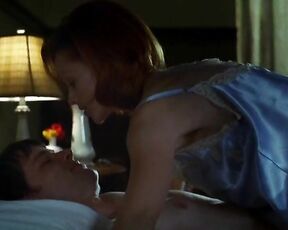 Lindy Booth kissing Tia Carrere and topless from behind in Dark Honeymoon!