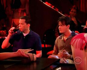 in Stripper wear tons of Cleavage and lapdance on Two and a Half Men!