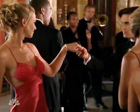 Cleavage and dancing in red dress on Chuck!