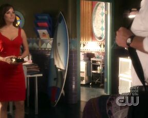 Cleavage and bra strap on Smallville!