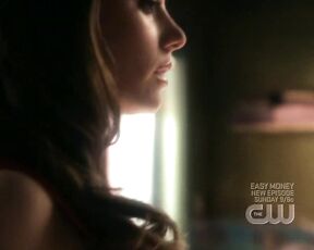 Cleavage and bra strap on Smallville!