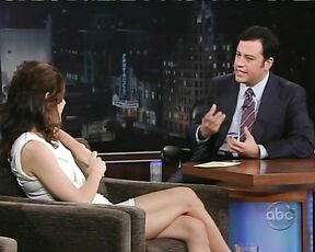 in short white dress on Jimmy Kimmel Live!