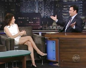 in short white dress on Jimmy Kimmel Live!