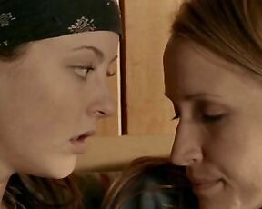 Katharine Isabelle and Michelle Nolden kissing each other in Show Me!