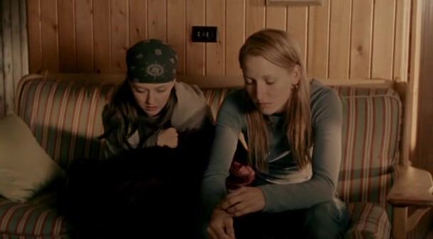 Katharine Isabelle and Michelle Nolden kissing each other in Show Me!