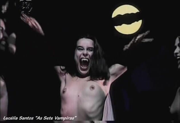 Nude with other women dancing around in As Sete Vampiras!