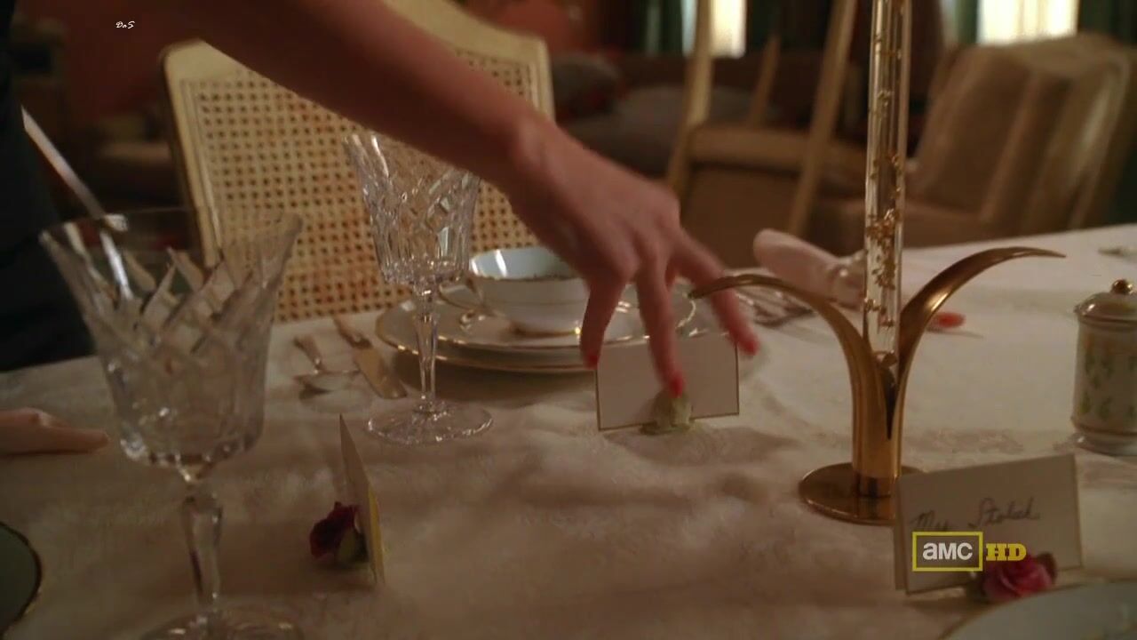 Cleavage on Mad Men s03e03 hdtv720p!