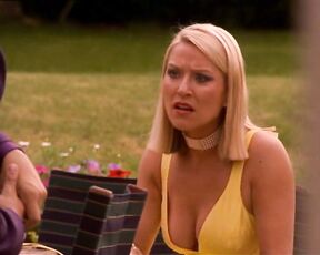 Topless in Bed and Cleavage/Undies in Footballers Wives!