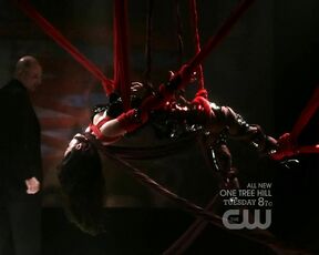 in leather on Smallville S10e3!