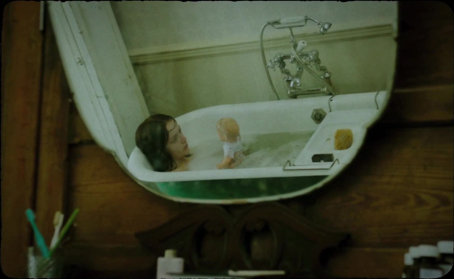 Nude in bathtub from The Quiet Ones!