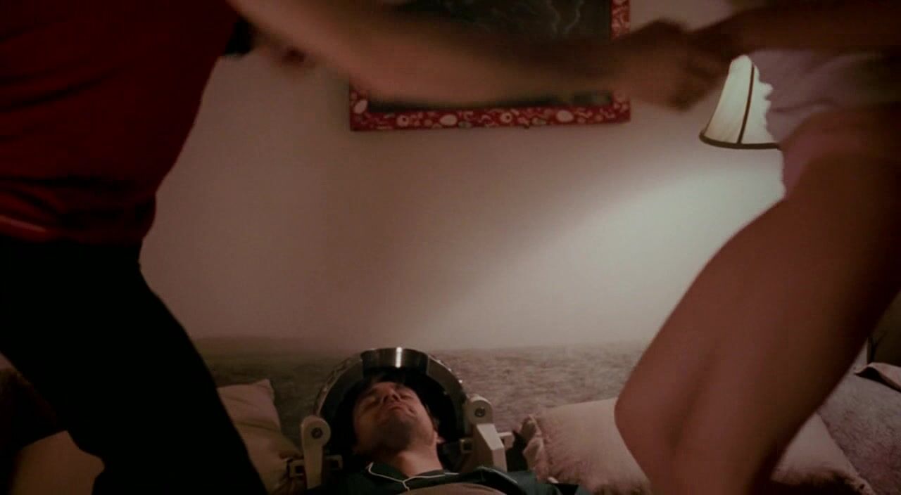 slight see-through jumping in bed and Topless from behind in Eternal Sunshine (HDTV)!