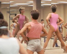 Jamie Lee Curtis and Marilu Henner in spandex with pokers in Perfect!