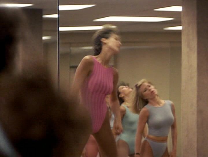 Jamie Lee Curtis and Marilu Henner in spandex with pokers in Perfect!