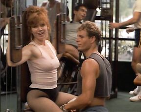 Jamie Lee Curtis and Marilu Henner in spandex with pokers in Perfect!