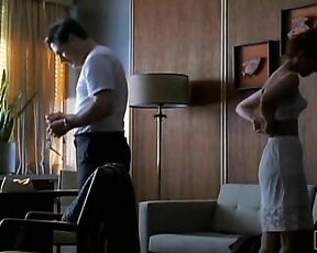 Topless from the side on Mad Men S01E12!