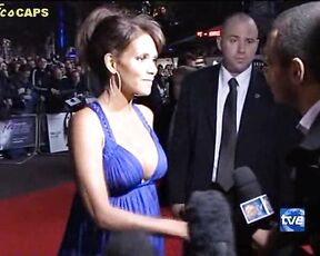 red carpet interview in that blue dress with huge boobs!