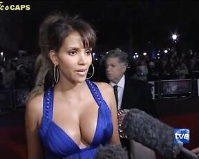 red carpet interview in that blue dress with huge boobs!