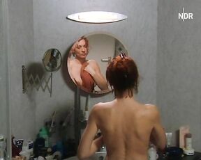 Naked in front of mirror from In aller Freundschaft: Alptraume!