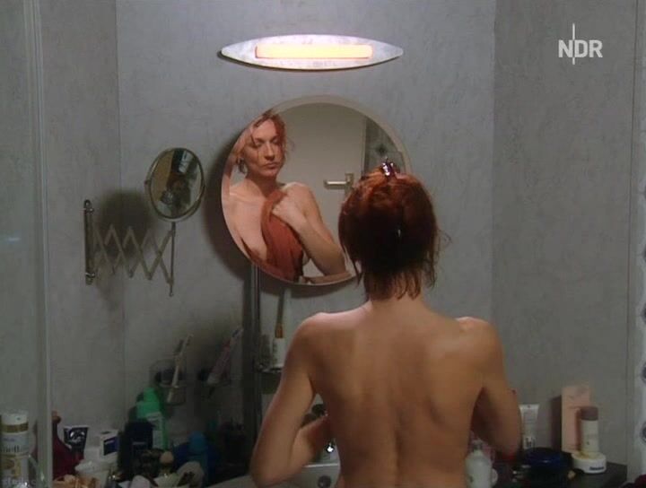 Naked in front of mirror from In aller Freundschaft: Alptraume!